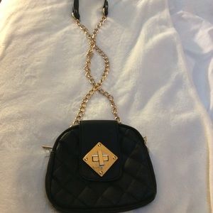 Cute black and gold mini purse